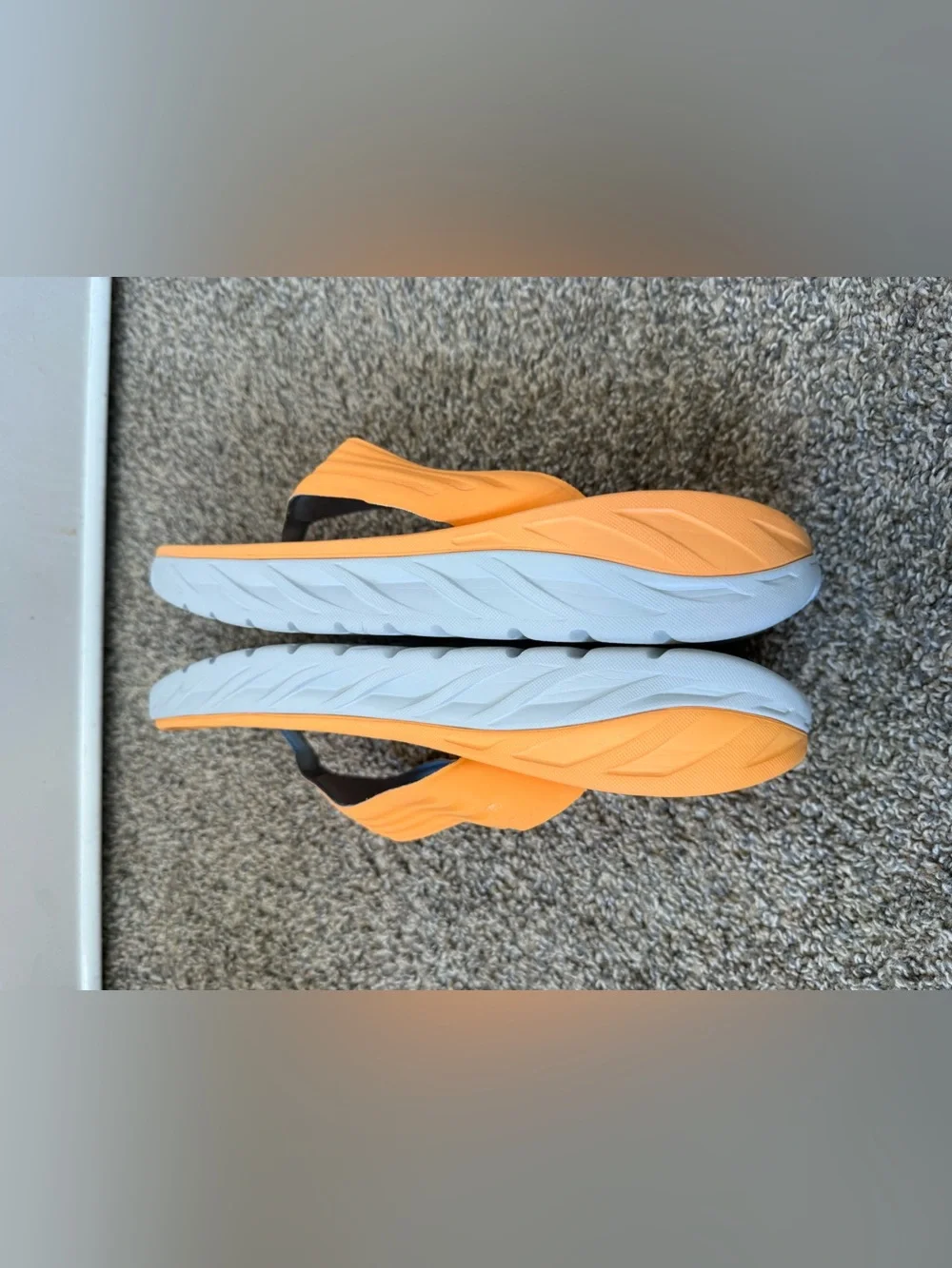 Hoka  size 11 men’s Orange and Blue Flip-Flop Sandals